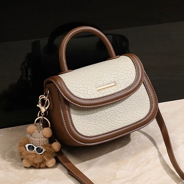 Genuine Leather Color Block Furry Pendant Handbag